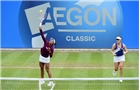 BIRMINGHAM, ENGLAND - JUNE 15:  Raquel Kops-Jones and Abigail Spears (R) of the United States in action during the Doubles Final during Day Seven of the Aegon Classic at Edgbaston Priory Club on June 15, 2014 in Birmingham, England.  (Photo by Tom Dulat/Getty Images)